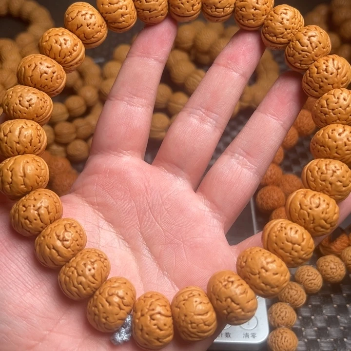 桃核手串好***来树王纽扣