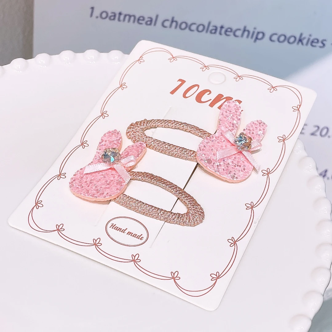 A-6496   1对粉色兔子亮片蝴蝶结额前刘海碎发掰掰夹       发圈