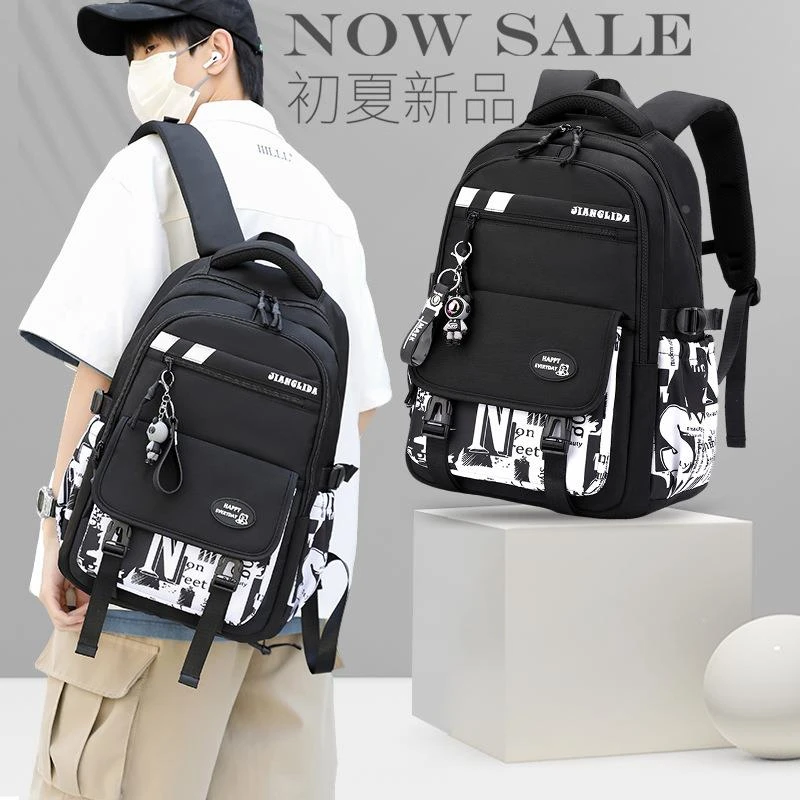 韩版初中生书包男大容量双肩包小学五六年级超轻便减负休闲背包