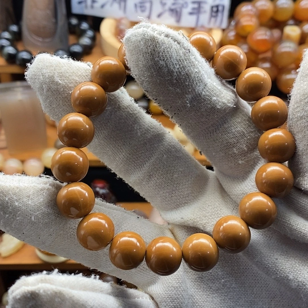 布艺非金属12mm精品原皮猴头手串