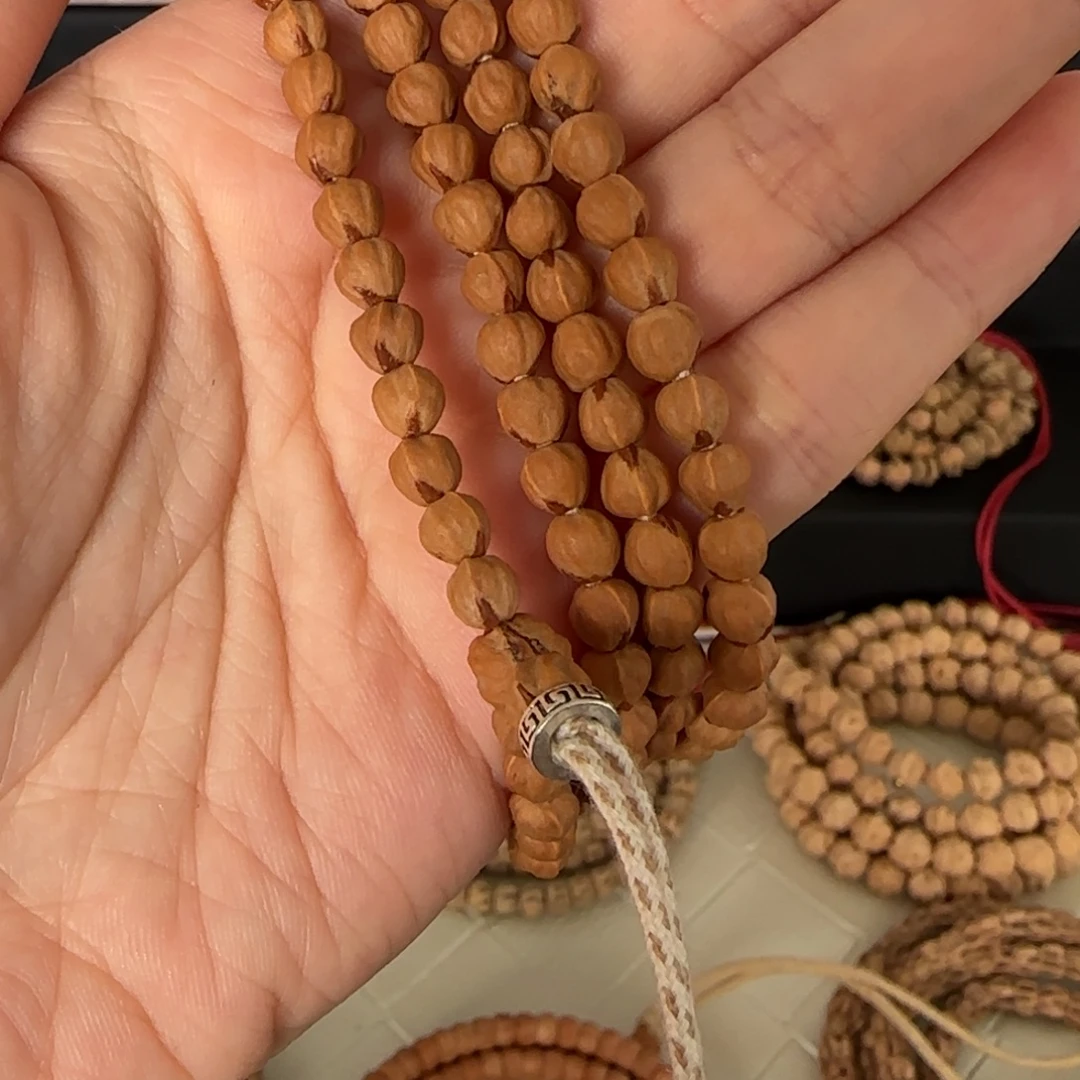 趣***心柏香籽/百香籽吊坠