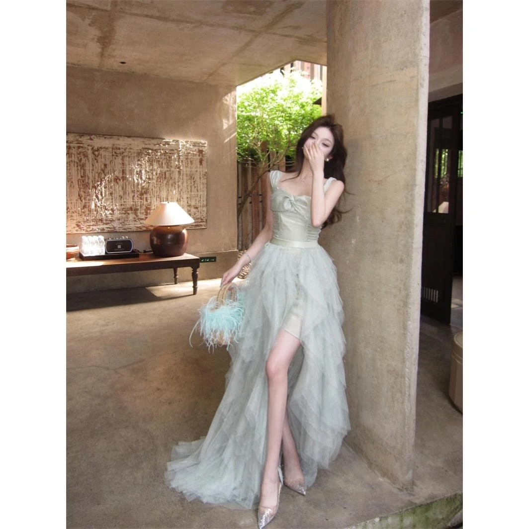 网纱拼接吊带连衣裙女夏季法式度假风长裙子收腰不规则开叉蛋糕裙