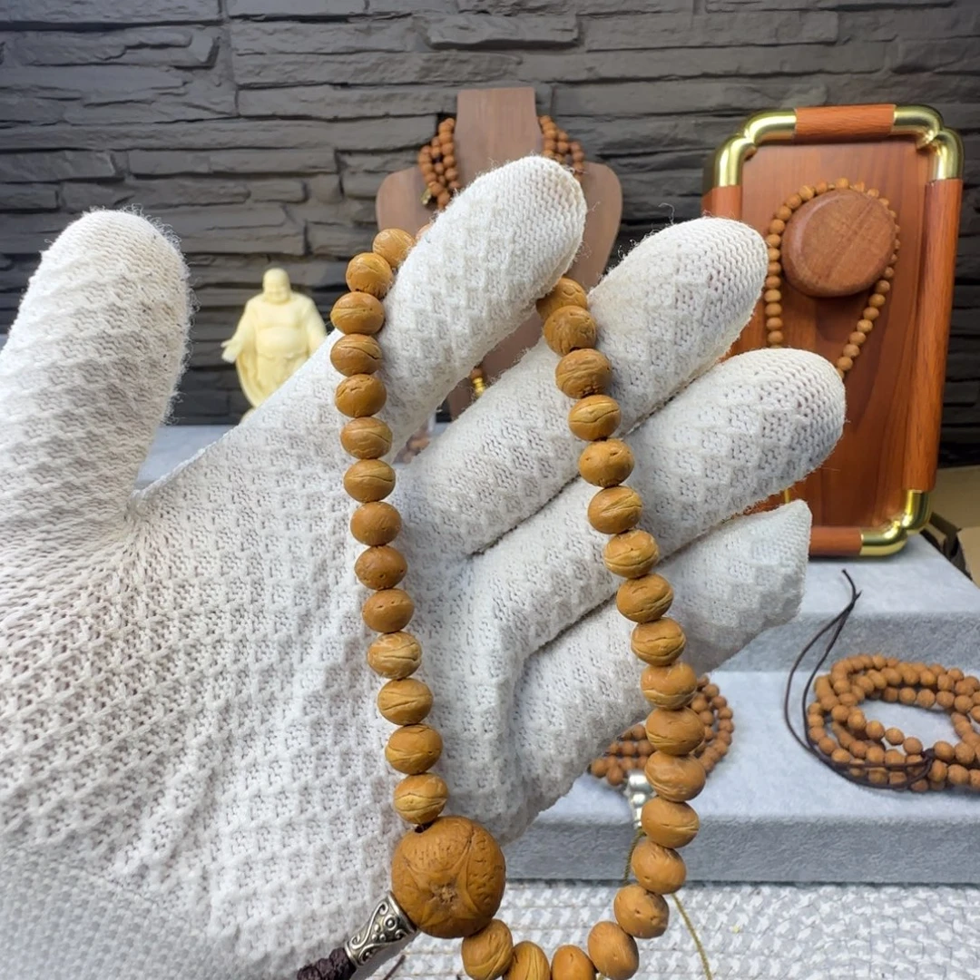 笑***说凤眼菩提吊坠酸枣核手串