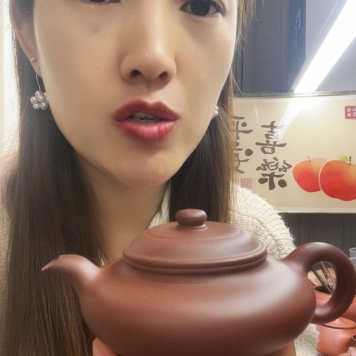 浮***面紫砂茶壶紫泥虚扁220cc