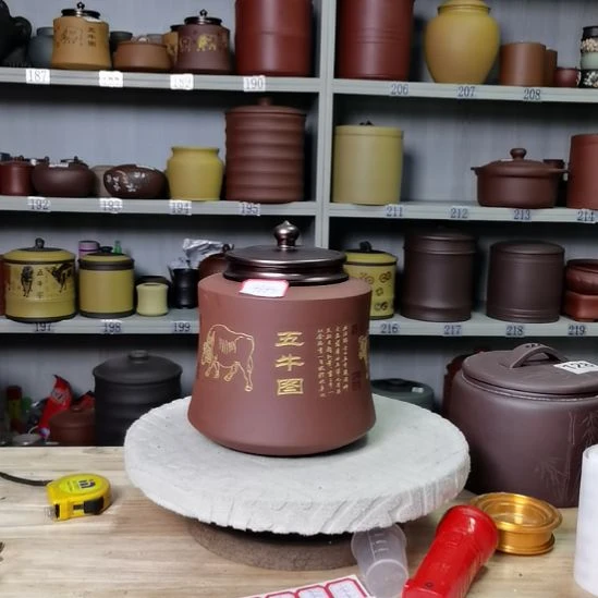 茶叶罐紫砂正品小罐合金盖吸力罐全手工五牛图