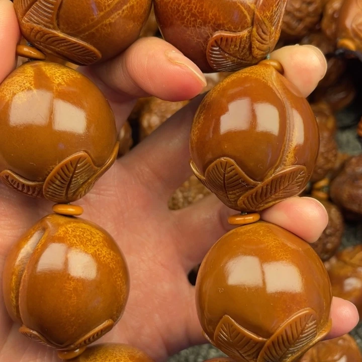 橄榄核吊坠德**尘橄榄核