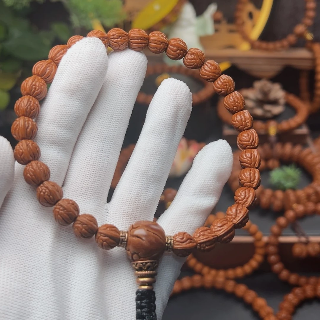 吊坠桃核小*0.9双脊龙手持