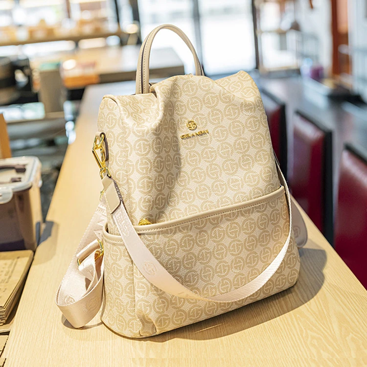 戈兰黛2025真皮高级时尚休闲多功能大容量百搭旅游小背包女双肩包