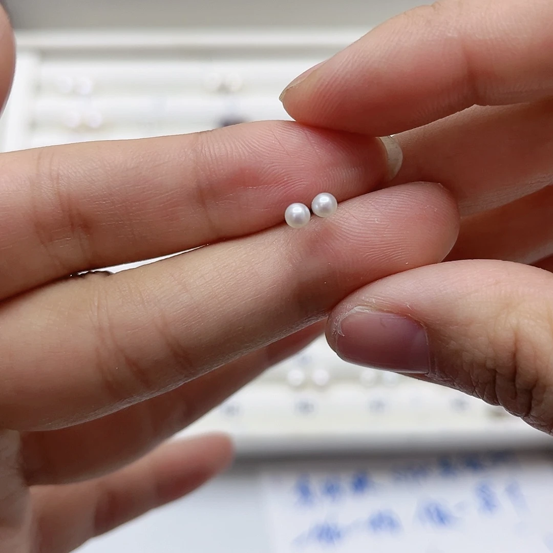 淡水珍珠耳饰银S925镶嵌与**争