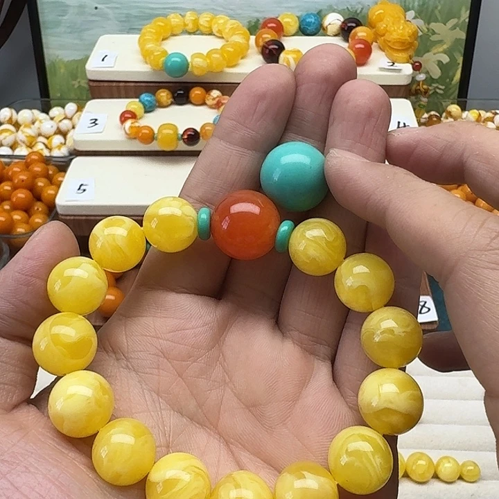 慕***儿非金属鸡油黄色素串搭配一条