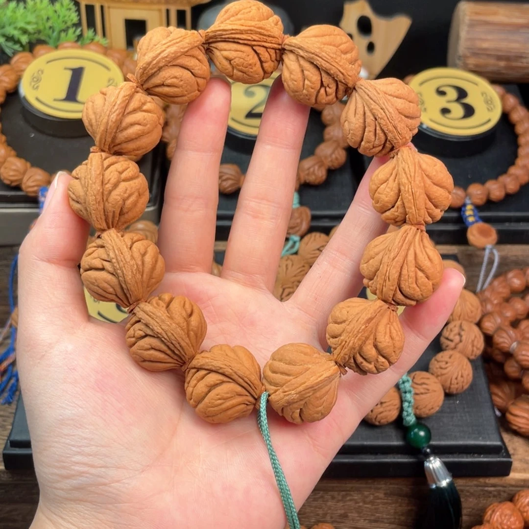 吊坠桃核霸王龙24编织绳