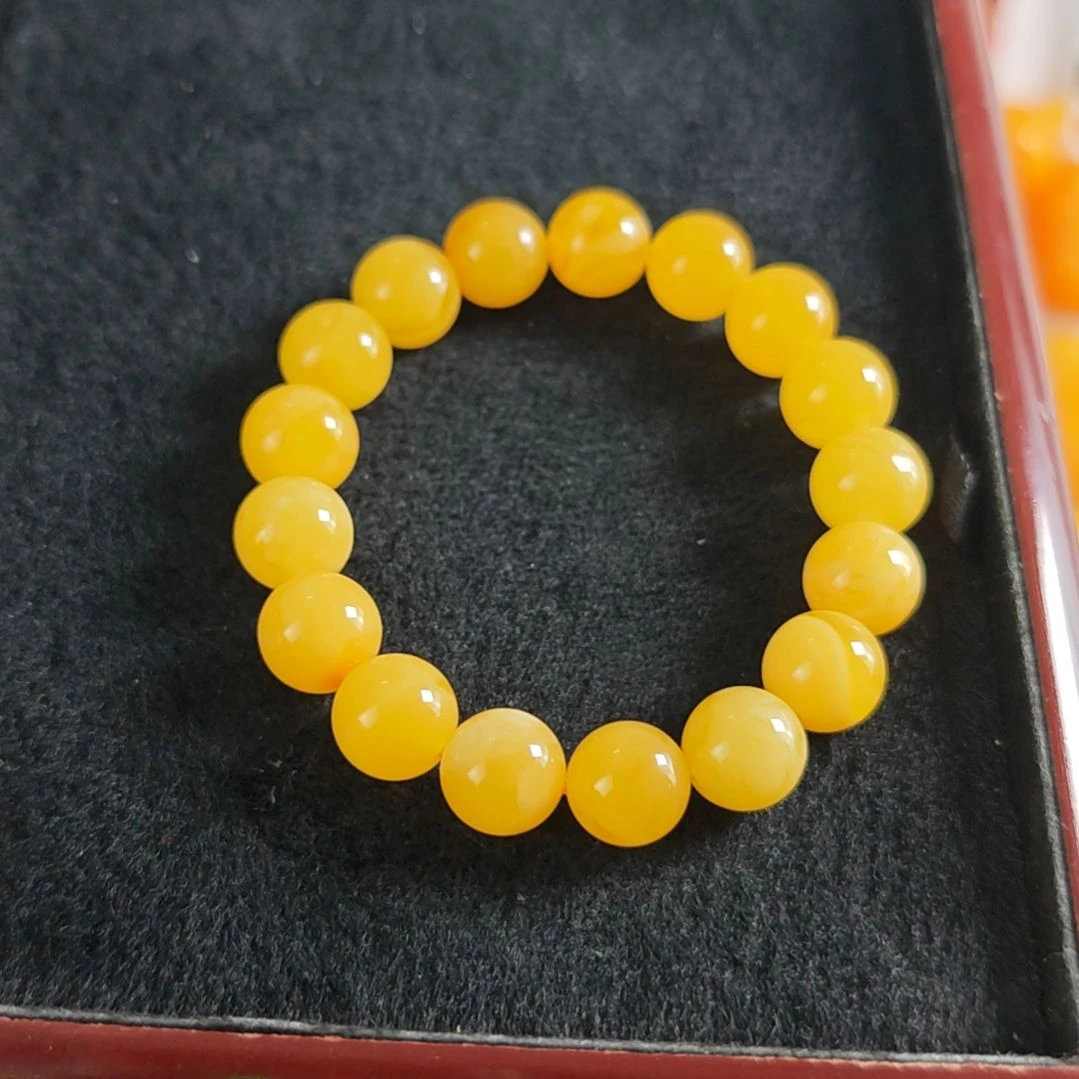 手串蜜蜡未镶嵌手串11m。