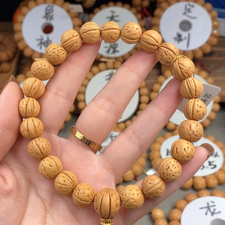 桃核手串金蝉子11.5a抛光板误差0.5