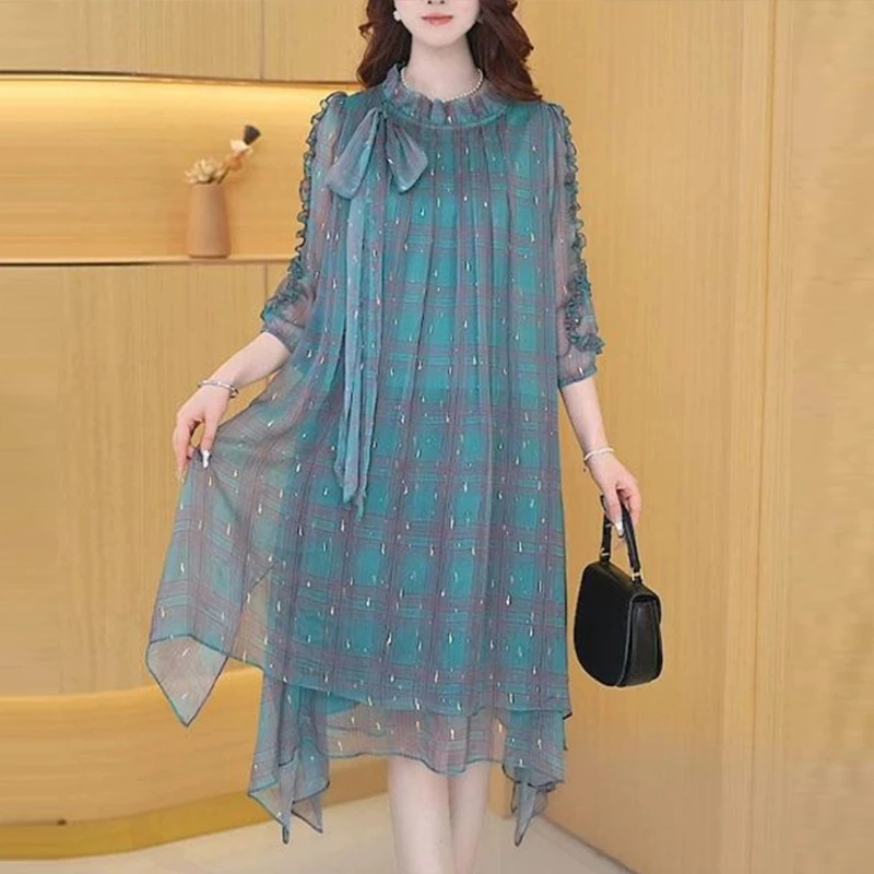 宽松藏肉连衣裙女春装2025年新款阔太太设计感爆款穿搭a字裙