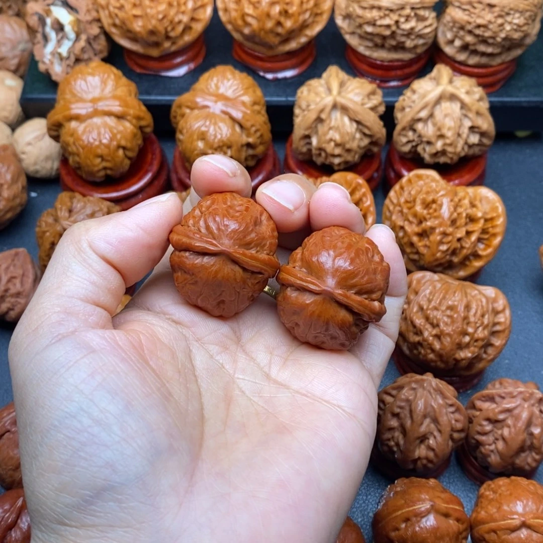 A***n把件文玩核桃蛇皮球