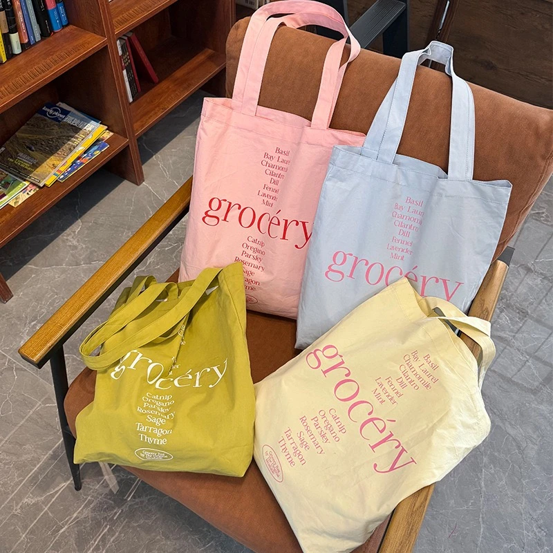 春夏新品grocery字母印花大容量简约ins风上班通勤单肩包