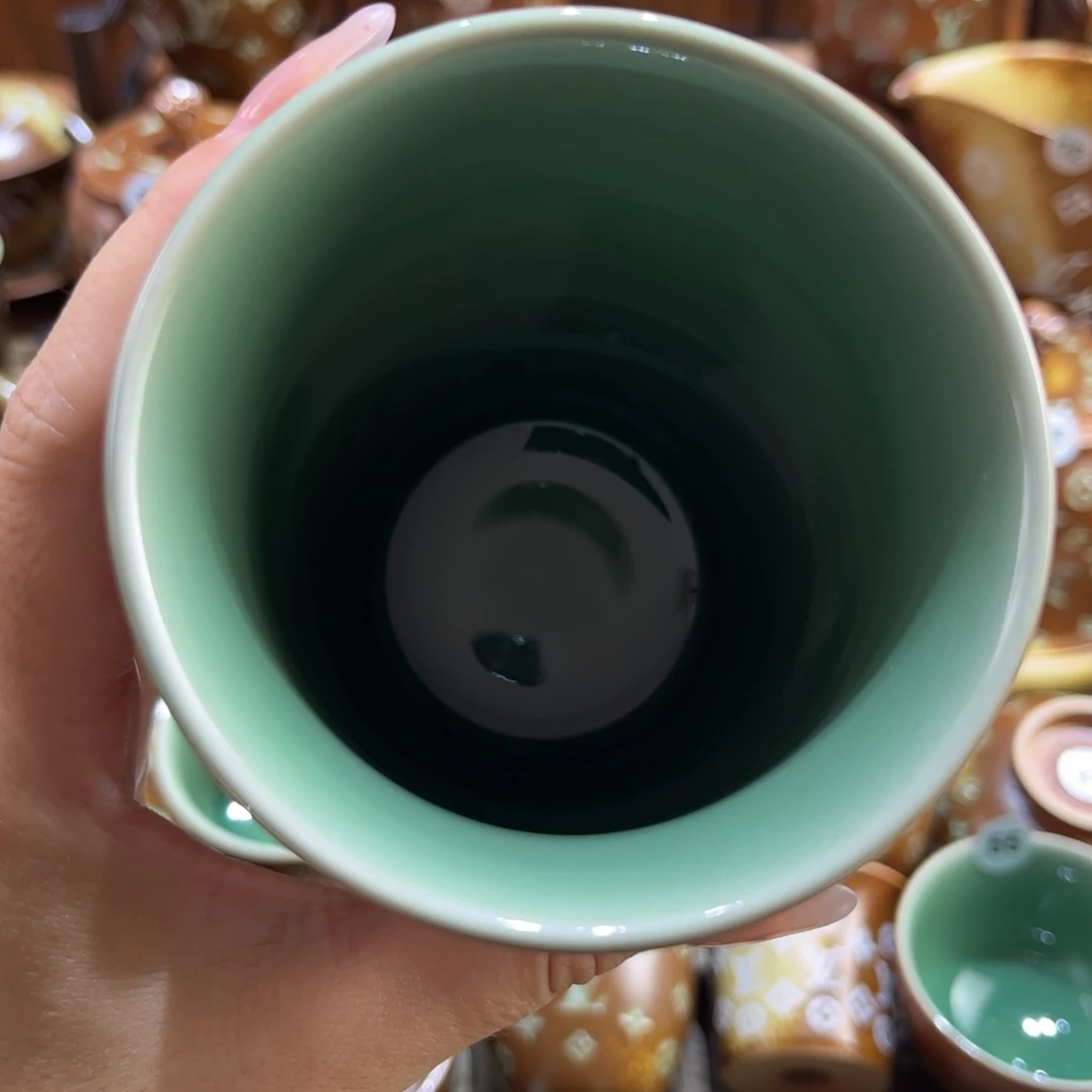 菩***_草木灰老花双釉奶茶杯