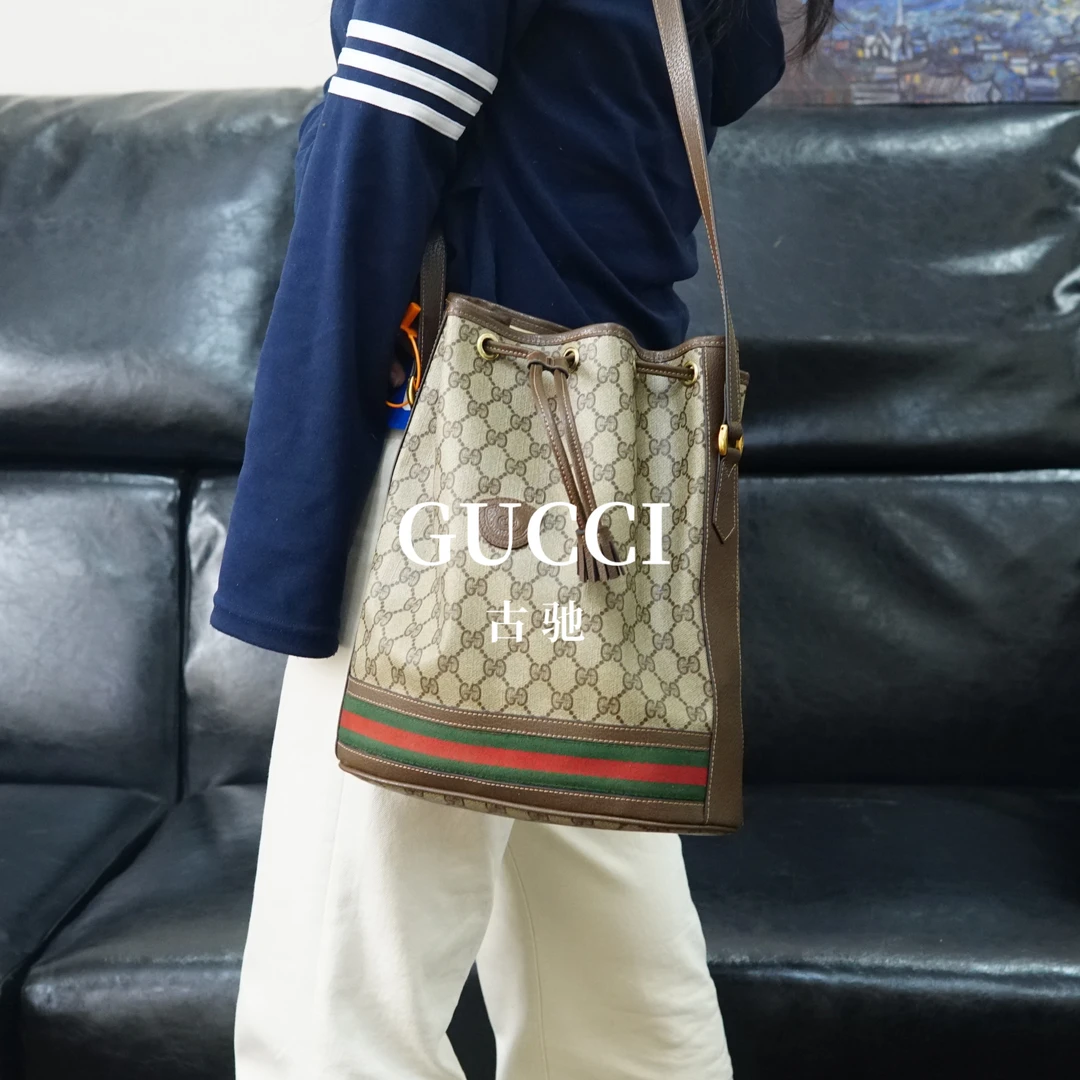 95新 GUCCI/古驰 老花抽绳斜挎包/F3ZG11530019/0019