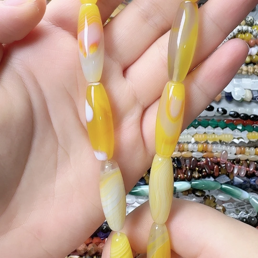 玛瑙/玉髓未镶嵌珠宝半成品黄玛桶珠一条