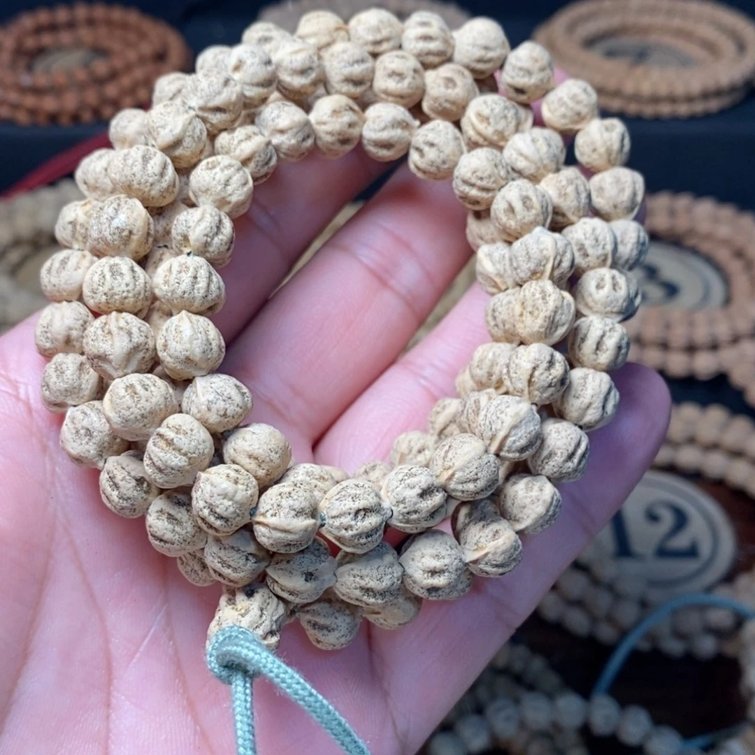 解***圃手串柏香籽/百香籽