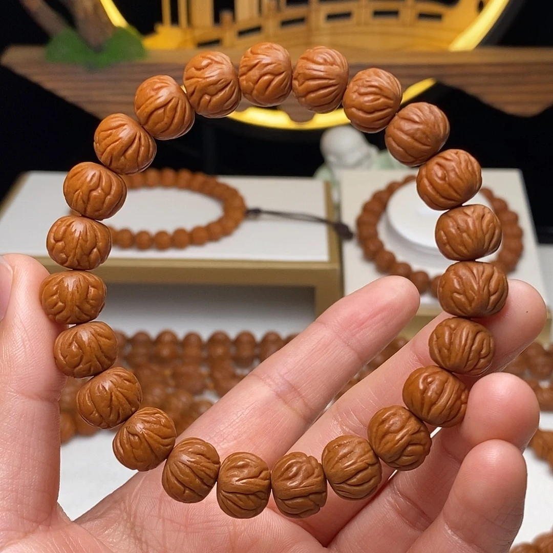 略***略手串桃核11mm野生小龙包桃核手串