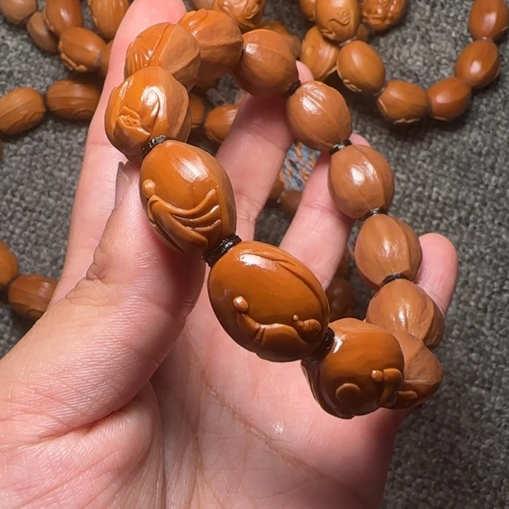 难***～橄榄核吊坠包衣无相佛