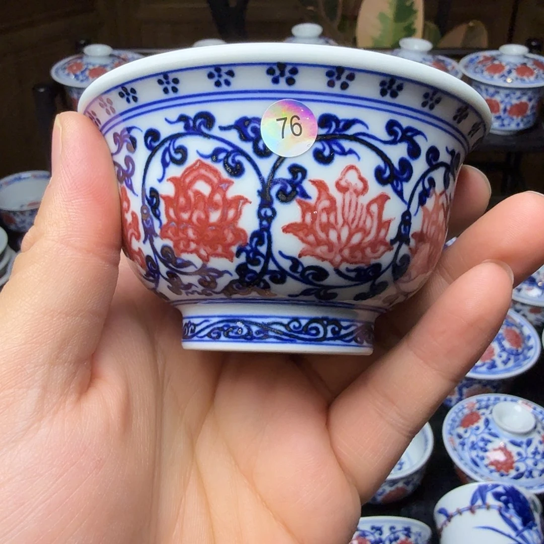 @***万青花釉里红花心压手杯