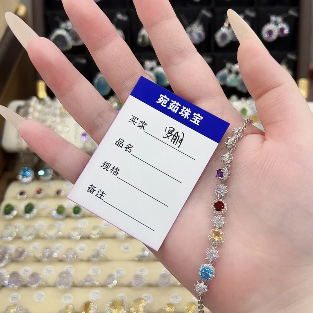 罗***莉银S925镶嵌蛇纹石玉戒指