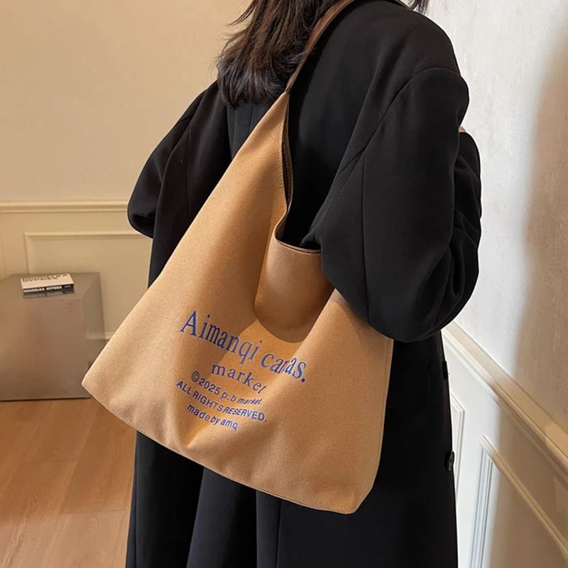 韩版文艺慵懒字母单肩帆布腋下包2025新款休闲时尚百搭学生托特包