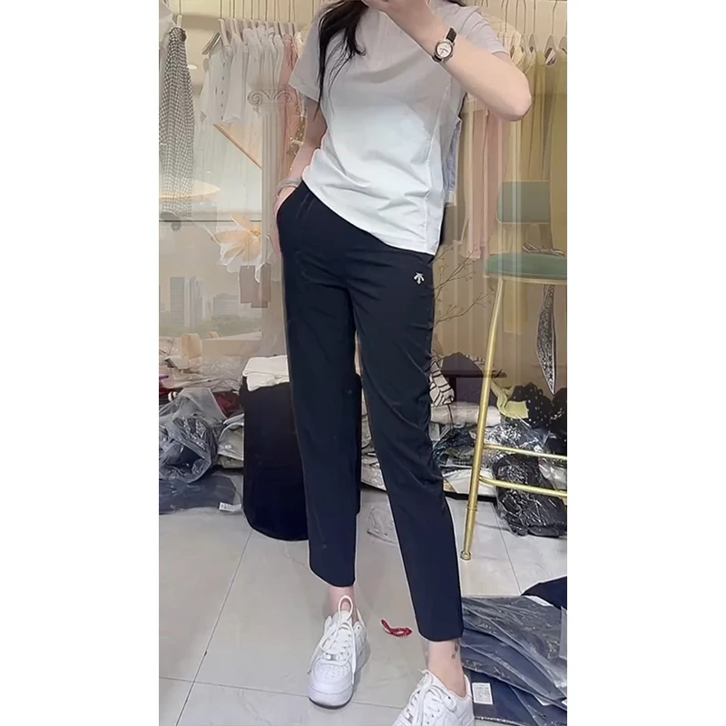 黑色休闲速干裤女2025年夏季薄款梨形身材小个子弹力九分烟管裤子