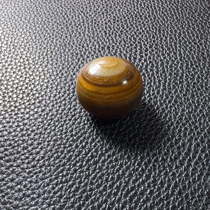 焰***瓷片马达加斯加奇石手把件