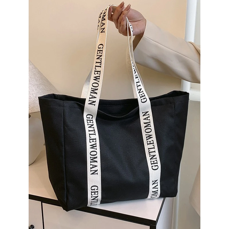 GentleWoman小众ins帆布包包2025新款女字母学生大容量托特单肩包