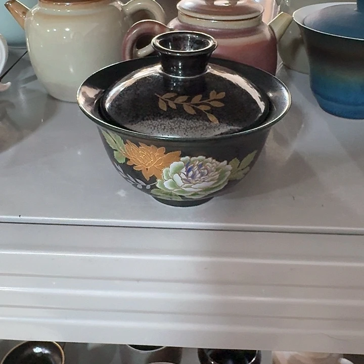 主人杯一个，瓷。。品茗瓷