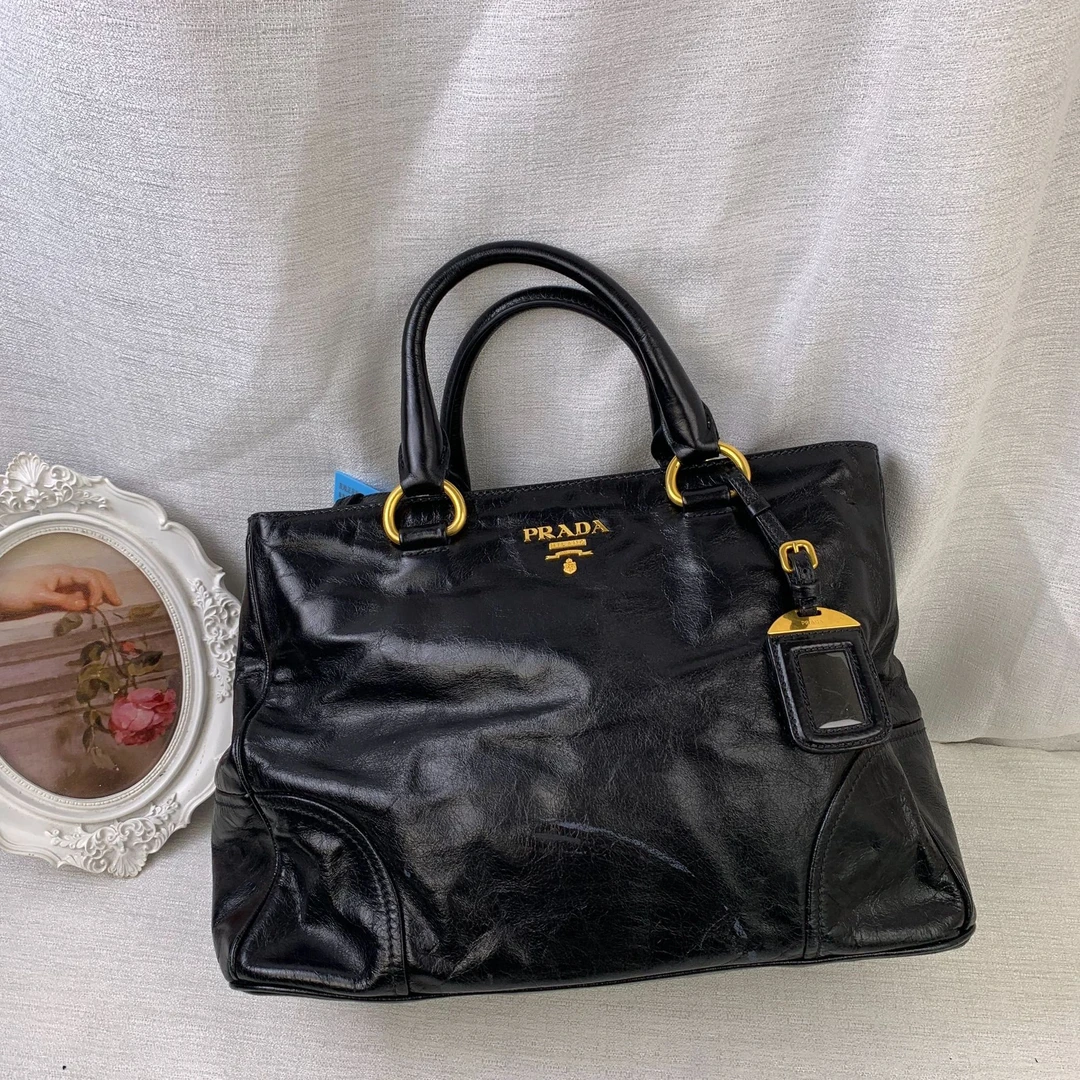 95新 Prada/普拉达 高级千金风黑金机车包/FYZH11117349/7349