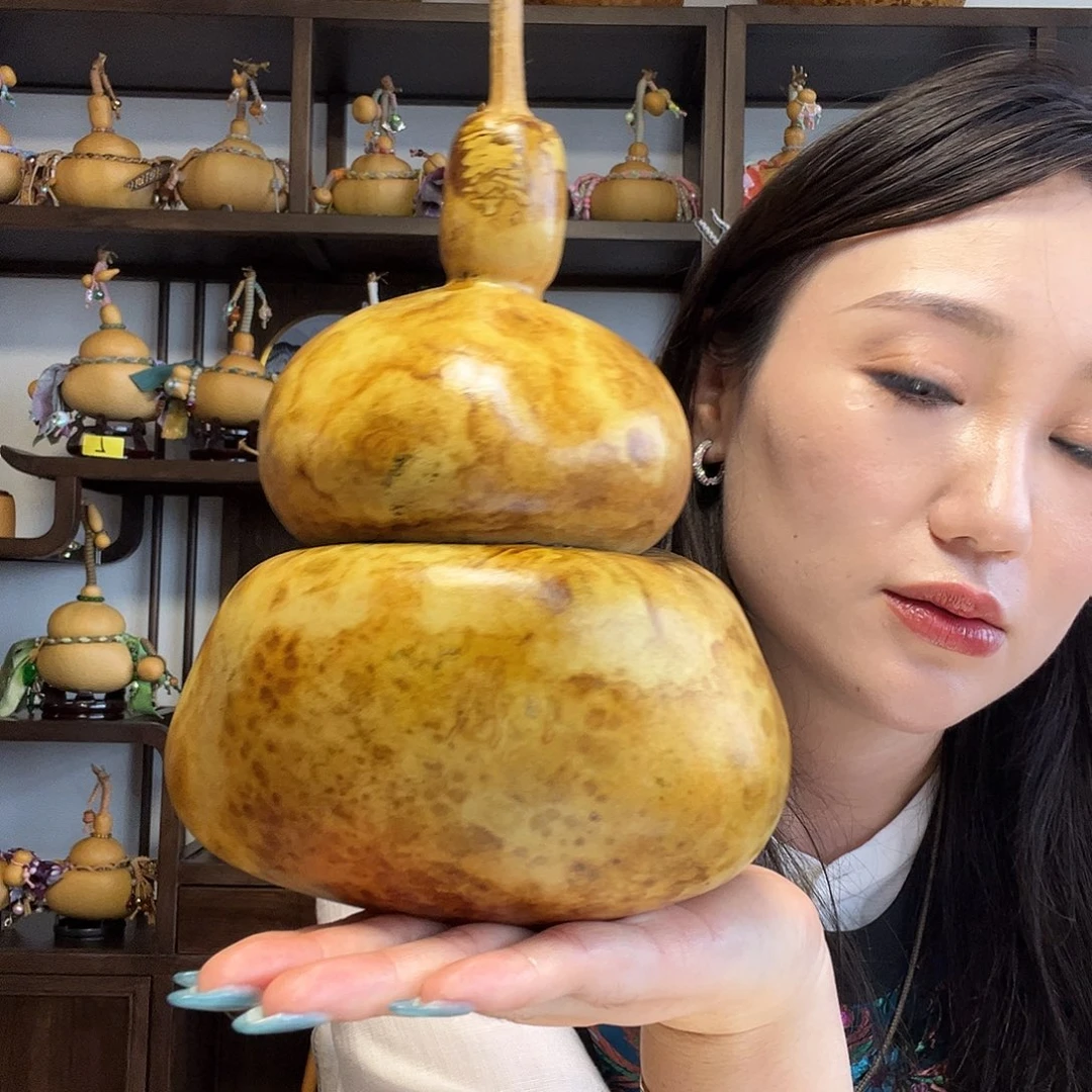 杨***亿花皮布袋葫芦把件