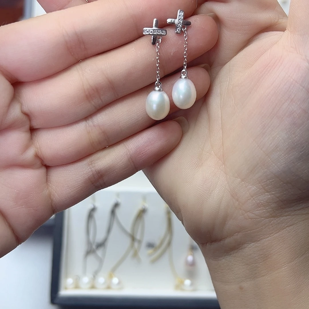 灵***儿淡水珍珠耳饰银S925镶嵌