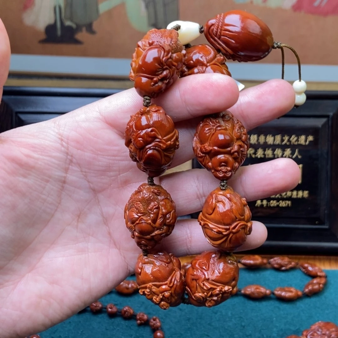 手串橄榄核骑兽弥勒