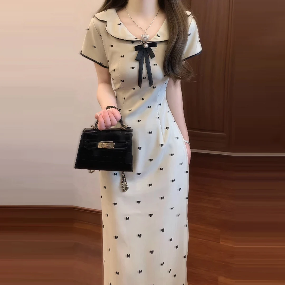 新中式改良旗袍娃娃领波点碎花连衣裙子女夏2026新款收腰国风长裙