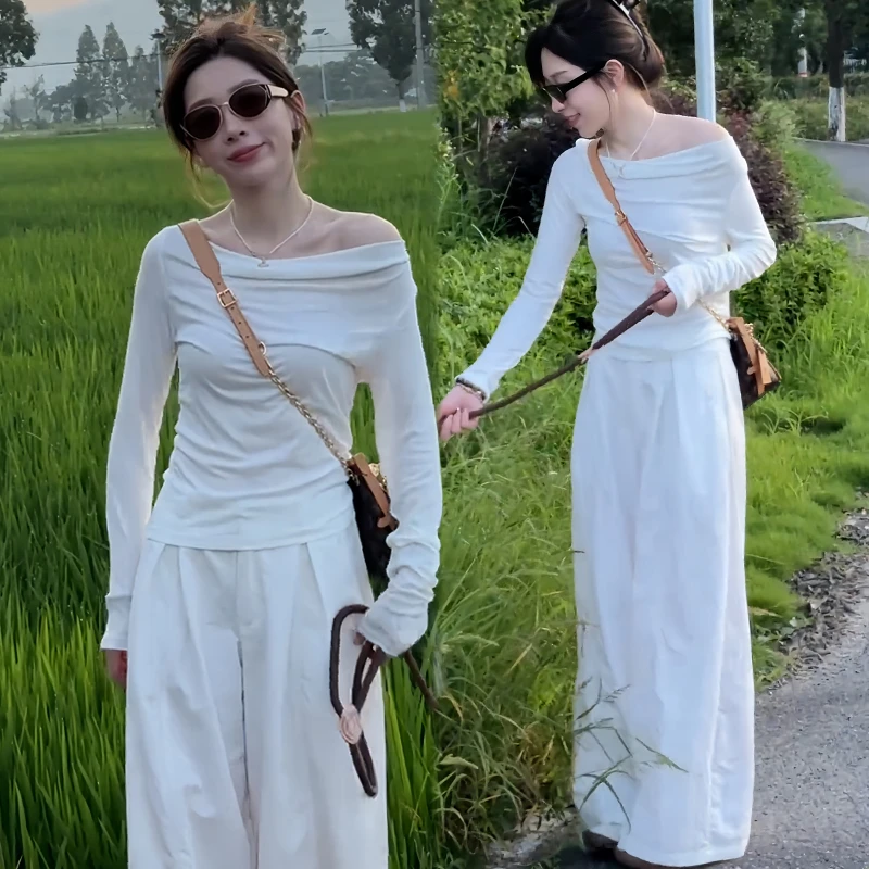 时尚设计感套装女2025年春秋新款气质女神范斜肩上衣阔腿裤两件套