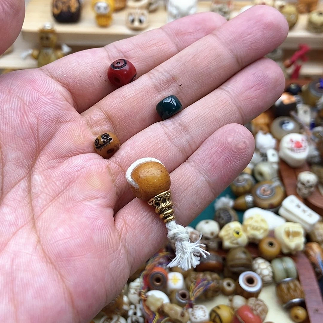 哲***敷其他驼骨配饰搭配