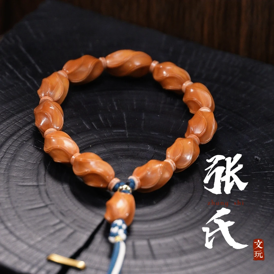 【张氏文玩】《扭转》15-16左右橄榄核雕刻  手持手串