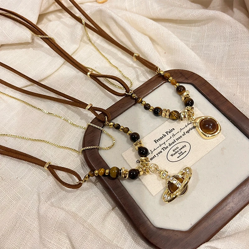 铜合金皮质项链 秋冬复古双层皮绳虎眼石毛衣链女美拉德配饰7491