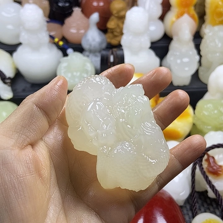 无花朵原石手把件