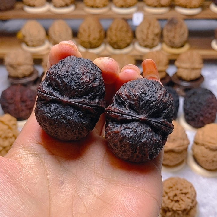 桃核把件心**空七彩元宝42mm