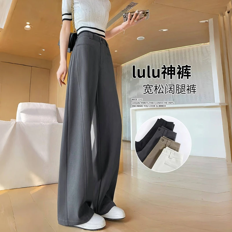 灰色高级感阔腿香蕉女2025新款垂坠感弯刀显瘦直筒黑色西装裤