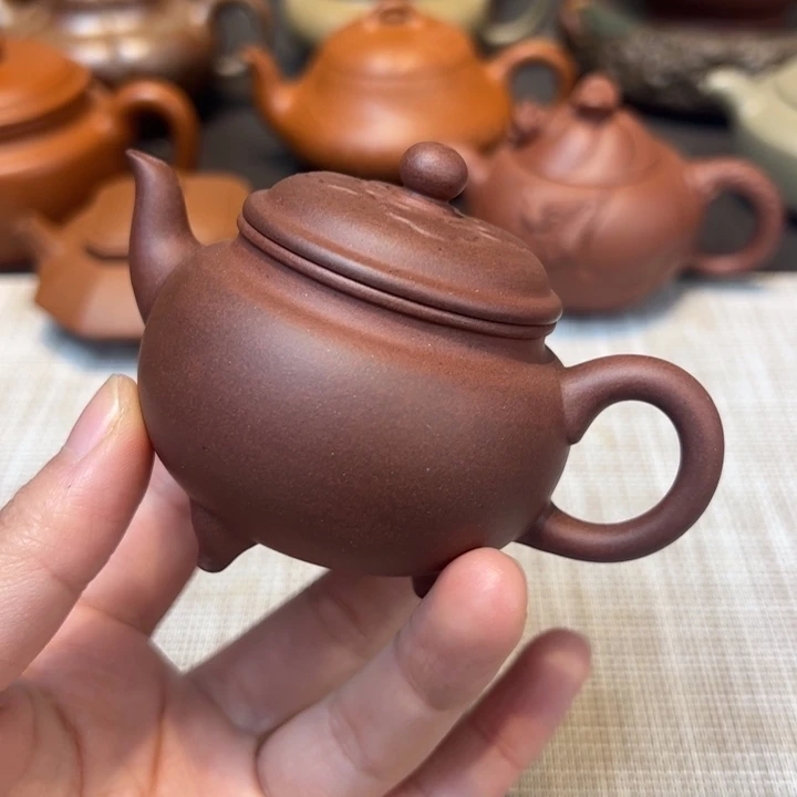 紫砂茶壶三足，容量85毫升，底槽清