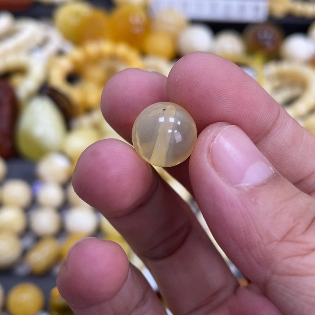 未镶嵌蜜蜡裸石12mm瑕疵特色荧光