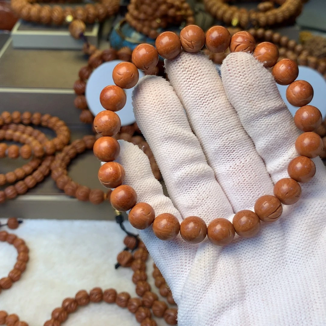 小***生手串桃核秦岭龙纹