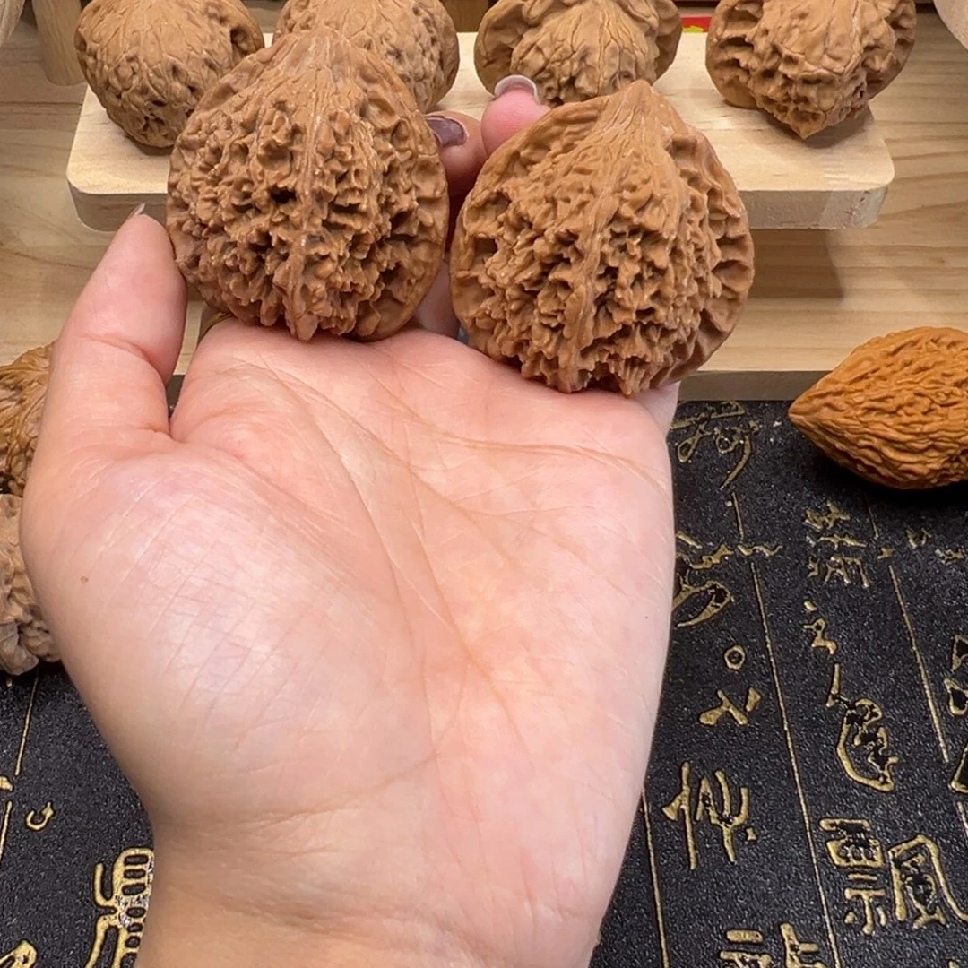 把件桃核满天星45手把件