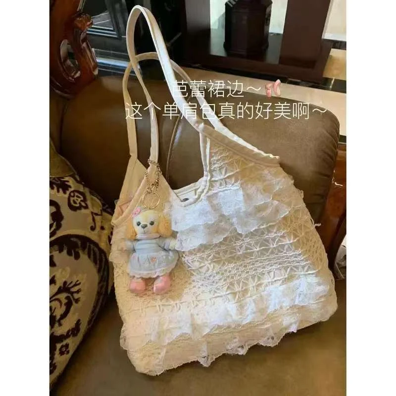 2025新款夏季休闲度假仙气蕾丝网纱单肩包简约大容量通勤腋下女包